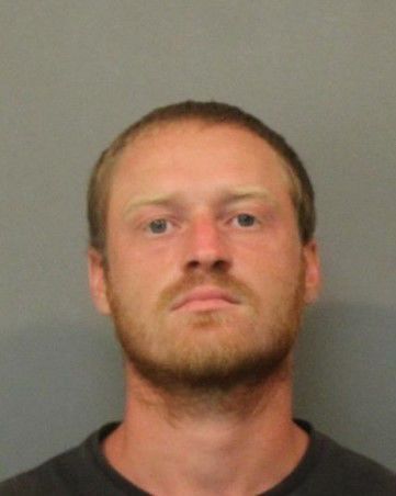 Aaron M. Woods